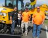 (L-R): R. Johnson and daughter, Logan, along with Matt Spisak and John Kuehner with the Ohio State University Facilities & Development Operations, enjoyed seeing all the JCB equipment.
