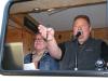 Jennifer Martin Upton and auctioneer TJ Freije scan the crowd for another bid from the auction truck.

