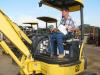 Eddie Beach of Midway Construction, Roxie, Miss., tests several mini-excavators of interest, including this Komatsu PC27MR.  
