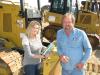 Susan and Mike Vandiver of Mike Vandiver Saw Mill, Hornsby, Tenn., check out the Cat D6K dozers. 
