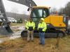Kenny (L) and Kevin Urig, both of K.M.U. Trucking and Excavating, take a closer look at this Volvo EC160E excavator.

