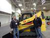 (L-R): Tony Miller and J.T. Kenngott, sales, both of Quality Forklift, Shakopee Minn., showcase this Wacker Neuson ST 31 track machine.

