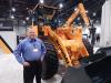 Tom Owen, CE sales manager of Hyundai, at his company’s booth at World of Concrete. Owen said Hyundai has an extensive excavator and wheel loader lineup to meet concrete contractors’ equipment needs.
