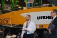 Clint Nichols of Liebherr USA introduces the 50 M5 XXT truck-mounted concrete pump to the World of Concrete audience.
