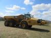 A highlight of the Yoder & Frey auction was a large selection of late model Caterpillar articulated trucks
