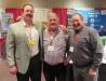 (L-R): Brad Grafmiller of Ventcon Inc. catches up with Vince Voetberg and Kevin Boyd, both of Jeffers Crane Service. 

