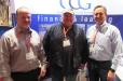 Steve Clelland (L) and Don Pokorny (R), both of Commercial Credit Group, talk with Pat Raquepaw of Interior Systems about equipment financing.
