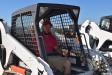 Austin Bruce of Central Florida Asphalt was having a good time taking this Bobcat skid steer for a spin before bidding on it for his business.
