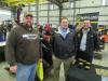 (L-R): Jamie Pretzel of J.L. Pretzel Construction talks with Jim Hershberger and Jason Miller of Rockland Manufacturing.