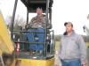 Clinton Chitwood (L) and Ryan Moore, both of C&C Equipment, Nashville, Ind., test operate a Cat 303.5e mini-excavator.