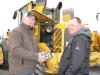 Inspecting the wheel loaders before they go on the auction block are Joe Finley (L) and Chris Adams, both of Twin States Utilities, Mt. Herman, Ky.