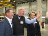(L-R) Yancey’s Jim Stephenson and Eric McKnight provide a tour of the facility for Tony Fassino, Caterpillar vice president of Building Construction Products, Cary, N.C. 
