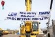 The 100,000th interval was completed on a Komatsu PC228USLC-10.