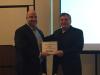 Jonathan Cook (L), vice president of sales at CP, presented Dmitri Cremo with the regional sales manager of the year award.