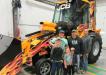 (L-R): Jacob, Mick and Dustin Hamilton, all of Hamilton Concrete, along with their kids Gavon, Jaxon and Lucus, admired the JCB GT at the event. 

