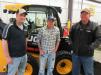(L-R): Buck & Knobby JCB’s Mark Burns spoke with Dylan and Mark Purk of M-Purk Farms LLC about the dealership’s range of JCB compact track loaders at the open house event.

