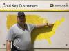 Dolomite Products’ Harry Gorrell places a pin in the John Deere Gold Key Customers map for the company’s Rochester, N.Y., facility where the 944K will be used.