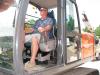 Jeff Isbell, owner of Isbell Services in Tuscaloosa, Ala., tests a Hitachi Zaxis 210LC.