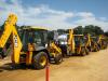 A package of JCB 3CX eco backhoe loaders rolled across the ramp on construction equipment sale day. 