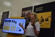Caroline Fisher of Caterpillar talks to the group about the next generation of Cat excavators at the Tampa event.