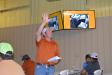 John Williams takes bids on a service truck at the recent Machinery Auctioneers’ sale in Odessa.
