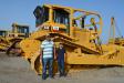 It seemed like family day at the Fort Worth event. Pablo Ramirez (L) and his son, Guido, check out a Cat D8N. Ramirez operates Obrero Construction in Mexico.
