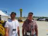 Austin Lebien (L) and Doug Wilson, both of Lebien Seeding & Fencing, take a tour of the outside of the new facility.