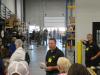 Mike Phelps of Foley Industries gives a tour to customers at the new Salina facility.
