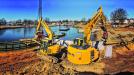 Woodstock Construction Group uses a pair of Komatsu tight-tail-swing excavators — a PC138USLC (L) and PC228USLC — to complete a project on Fire Island, N.Y. “Our job sites might look big, but once we get equipment, people and material there, it turns into a Honda Civic quickly,” said Vice President Patrick Woodstock. “The PC138 and PC228 help us create both a safe and efficient work space.”
