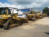A nice selection of Cat dozers makes its way across the ramp on day one of the two-day sale.