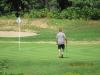 Chris Roseberry of the Travis Mills Foundation is the “boss of the moss” as he walks to his ball on the green.