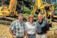 (L-R) Pine Bush Equipment (PBE) Sales Rep Jim Boniface visits with President Stacey Tompkins and Secretary Mark Tompkins of Tompkins Excavating. The company purchased its first equipment Boniface Jim and PBE in 1986.