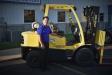 Joe Wilson, president of Berry Companies Inc., stands beside one of the Hyster forklifts his company now offers as a result of the acquisition of Sellers Equipment.

