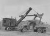In 1945, Seabees use a 1.5 yd. Northwest Shovel to load a truck with coral. Coral, being readily available, was used as fill, as a subbase for airstrips and a multitude of other uses in the Pacific.
(U.S. Navy Seabee Museum photo)