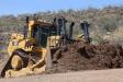 Teck’s newest D11T will be used for production dozing, dump area support, mining shovel support and haul road development. Here the Cat D11T works via remote control.