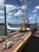 After a military-chartered plane crash-landed in the St. Johns River in Jacksonville, Fla., on May 3, Mobro Marine utilized its American 11320 450-ton crawler crane on a 180 by 54 by 12 ft. barge and a Kobelco CK1600G-2 on a 150 by 50 by 7 ft. barge to lift the aircraft prior to transportation.