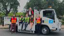 The Yarra City Council intends to use the electric tipper for hard rubbish collections and is exploring how to transition to electric garbage and recycling trucks over the next five years. (L-R) are: Peter Moran; Austin Philips; Glen Walker; Danae Bosler; Chris Leivers; and Joe Agostino (standing on truck).  
