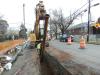 Crews remove an old water main on Staten Island.