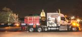 This year’s theme was “Delivering Enchantment!” On the side of the Kenworth W990 hood, the graphics wrap showcased New Mexico’s state flag, along with Ship Rock, a 7,177 ft.-high mountain rock that resembles a 19th century clipper ship. On the door and sleeper, the U.S. Capitol Building was shown with a Christmas tree, with the wording: “From the Land of Enchantment to Enchanting the Nation” written above the graphics. (James Edward Mills photo)