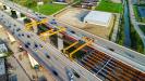 Gantry crane system works to set a steel girder across span 5.
(ODOT photo)