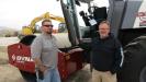 Jared Lambeth (seated) of Las Vegas Paving Corp and Pete Fredrickson of Dynapac prepare to test the compaction abilities of the newly-developed seismic system on the CA3500D.
