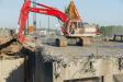 Excavators are key to the demolition and construction of the new bridge.