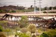 A 150-ft. portion of a century-old bridge was demolished as part of the cleanup process after the bridge was damaged in a train derailment and fire in the city of Tempe and many partners assisted Union Pacific in the demolition.