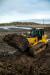 The purpose-built 963 low ground pressure (LGP) model provides even more traction and flotation for working in muddy or rocky conditions. A waste handler configuration, with specialized factory guarding and seals, is available.