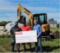 SANY America presented a check and an SY35U excavator to The Travis Mills Foundation at its facility in Rome, Maine. (L-R) are Joe Duplessis, Northeast District sales manager of SANY America; Travis Mills, founder of The Travis Mills Foundation; and Ben Miller, vice president of sales of construction equipment, SANY America.