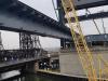 Serious coordination was required to install the lift spans for the new bridge, including crane operations.
