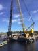 Equipment being used on the Perquimans River Bridge project includes a Kobelco CK-2750 crawler crane for pile driving and FIB girder erection; a PileCo D-125 diesel pile hammer; and a contractor-built, barge mounted 50-ton crane, “Annapolis” for girder erection. 
(NCDOT photo)
