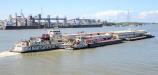The Motor Vessel Benyaurd pushes the mat-sinking unit through the Mississippi River in New Orleans, La., in October.
(USACE photo)