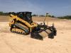 Ideal Landscaping’s new Caterpillar 299D3 with a Cat BB124 box blade on the front end of the loader is designed for grading and leveling.
