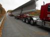 One of the girders for the new bridge is delivered.